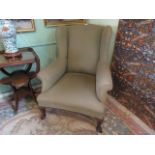 A Victorian wing backed armchair, 76cm wide.