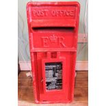 A mid-20th century Post Office post box, bearing the ER insignia, 61cm x 26cm.