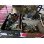 Three boxes containing assorted items, to include: a novelty money box, miners lamp,