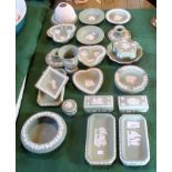 A quantity of Wedgwood Jasperware, the majority on a sage green ground, to include: pin dishes,