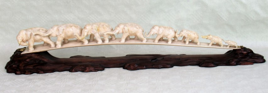 A signed Meiji period (1868-1912), ivory okiomo of elephants,