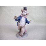 A Lladro model of a clown, with a ball at his feet, no. 6927.