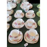 A Vale bone china part-tea service, comprising: six trios, square sandwich plates,