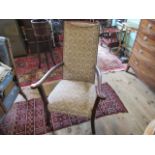 An early to mid-20th century upholstered armchair, 65cm wide.
