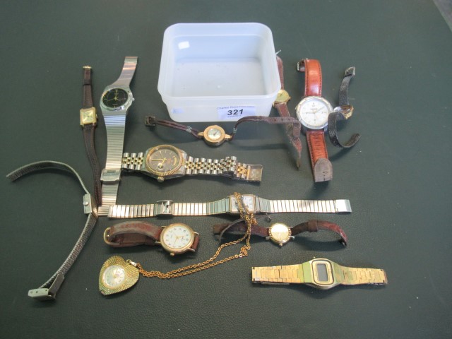 A quantity of lady's and gentleman's wristwatches.