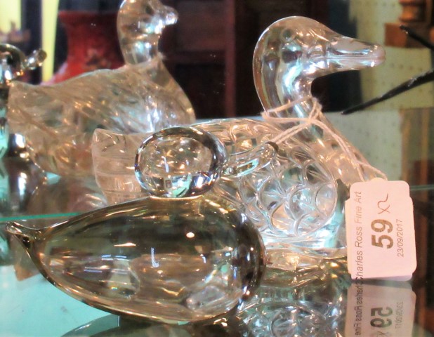 Two glass figurines, each modelled as ducks, the tallest 9cm.