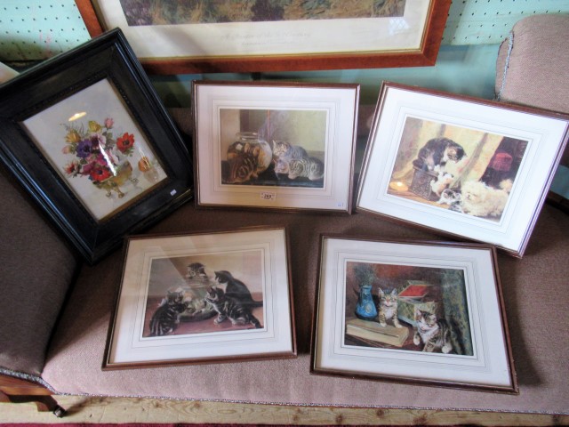 Four framed and glazed prints, each of cats, together with a still life study of flowers, prints,