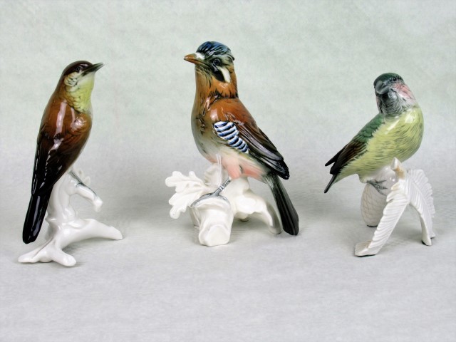 Three Karl Ens bird figurines, to include: a Jay, Fly Catcher and Crossbill, the tallest 16.5cm.