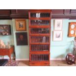 A mahogany Globe-Wernicke six tier bookcase, 87cm x 230cm.