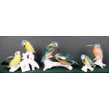 Four Karl Ens bird figure groups, to include: a pair of Kingfishers, a single Kingfisher,