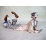 A Lladro model of a recumbent clown, no. 4618, 37.5cm wide.