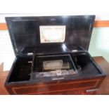 A 19th century mahogany cased Swiss music box, having twenty Airs, the interior label signed Lith.