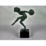 An early 20th century French Art Deco green patinated spelter figure of a tambourine dancer,