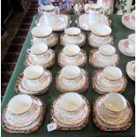 An Edwardian bone china part-tea service, comprising: ten trios, two sandwich plates,