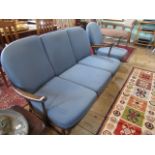 A mid-late 20th century ercol lounge suite, comprising: three seater sofa,