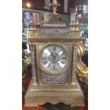 A large late 19th century gilt brass mantle clock,