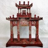 A large Chinese soapstone model of a gateway,