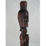 A large carved hardwood tribal ritual/ceremonial staff, possibly of Indonesian origin,