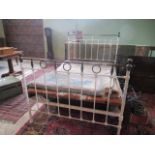 A white painted brass double bed, 202cm x 140cm.
