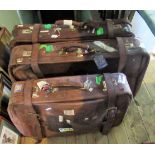 A set of three graduated leather suitcases, retailed by Harrods, signed Franzen, West Germany,