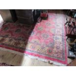 A large rectangular carpet of Eastern design, 345cm x 275cm.