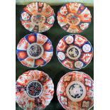A collection of six Japanese Imari plates, each circa 21cm diameter.