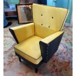 A circa 1950's child's armchair, finished in yellow vinyl, 51cm wide.