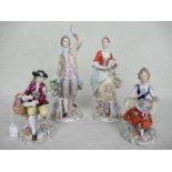 Two pairs of late 19th century Sitzendorf porcelain figurines, the tallest 22cm.