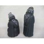 Two Lladro figurines, each modelled as Chinese elders, the tallest 21cm.