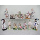 A collection of fourteen 19th century and later porcelain figurines, largely Continental,