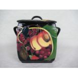 A contemporary Moorcroft box and strap handled cover,