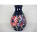 A large William Moorcroft vase in the Anemone pattern,