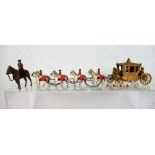 A mid-20th century Britains-style coronation coach and eight horses,