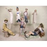 Seven assorted Lladro and Nao figurines, the tallest 25cm.