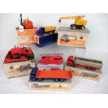 Seven boxed mid-20th century Dinky die-cast vehicles, to include: a (561) Blaw Knox Bulldozer,