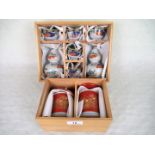 A contemporary Japanese boxed pair of Sake bottles and six cups,