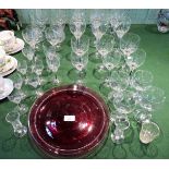 A late 19th century cranberry glass dish, having applied beaded decorated with gilt border,