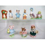 Nine Beswick Beatrix Potter figurines, to include: Squirrel Nutkin, Tom Kitten, Johnny Town-Mouse,