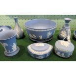 Seven pieces of light blue Wedgwood Jasper, including: two baluster vases, bowl,