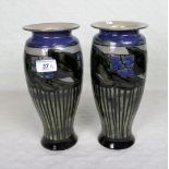 A pair of early 20th century Royal Doulton vases of cylindrical tapering form,