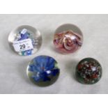 A mid-20th century Selkirk glass paperweight, together with three others, various.