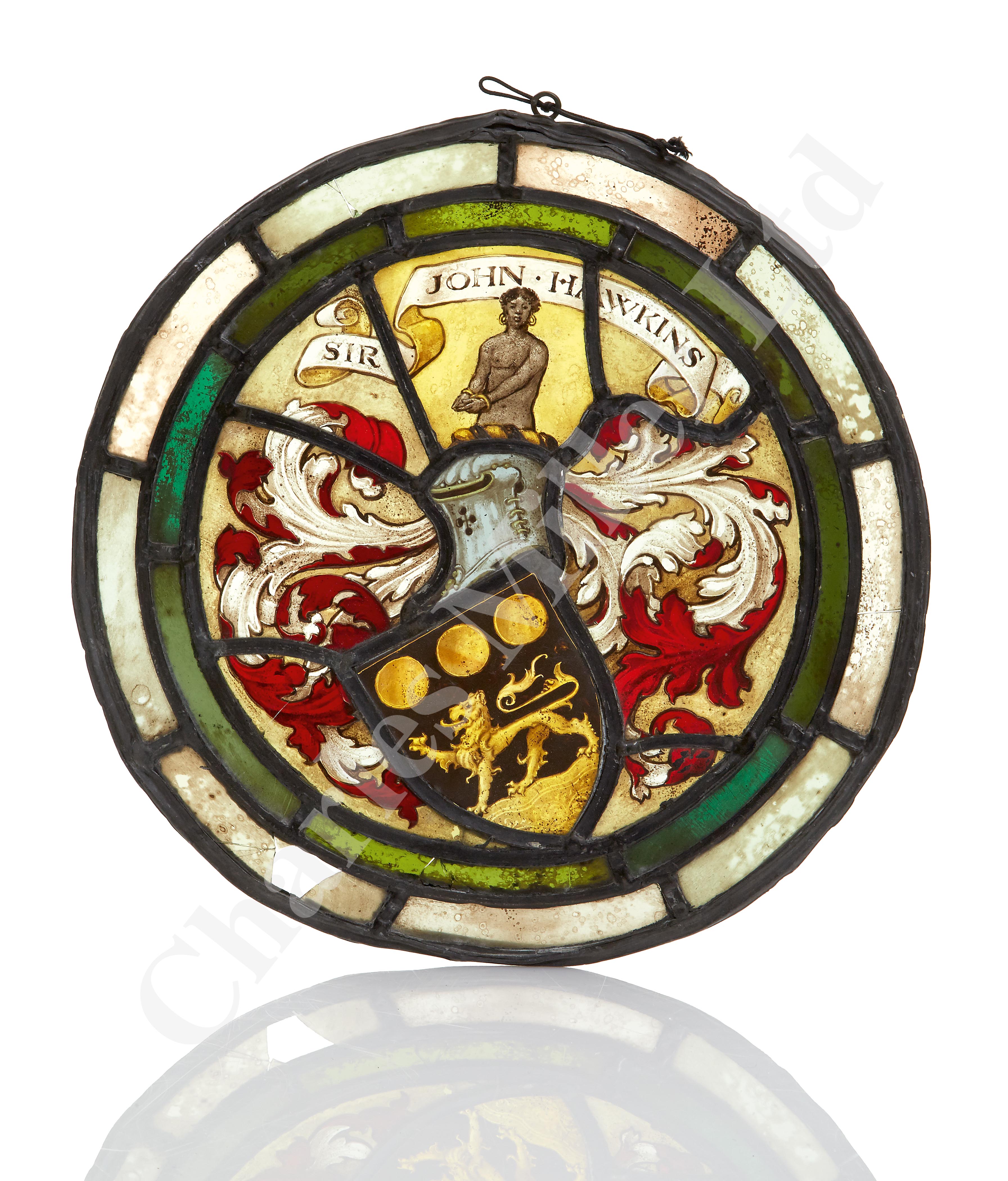 A 19TH CENTURY STAINED GLASS ROUNDEL BEARING THE ARMS OF ADMIRAL SIR JOHN HAWKINS