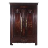 French Provincial carved walnut armoire last quarter 18th century, molded crown and brass nailhead