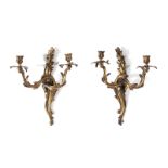 Pair Louis XV style gilt-bronze two-light bras de lumiere H17"" W14"" D9"" (2pcs) Provenance: Estate