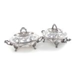 Pair Elkington & Co silverplate covered entree dishes dated 1851, Gothic Revival design and engraved