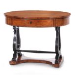 Biedermeier ebonzied cherry writing table, manner of Danhauser circa 1820, oval top on conforming