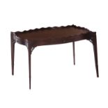 English serpentine mahogany tea table circa 1900, galleried top, candlestands, tapered legs; H19"