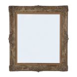 Carved and painted wood framed mirror early 20th century, H42" W38" Provenance: Millicent