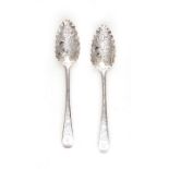 Pair George III sterling berry spoons, Thomas Wallis II London, dated 1801, allover leaf and vine-