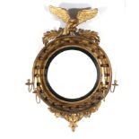 Regency carved giltwood girandole mirror